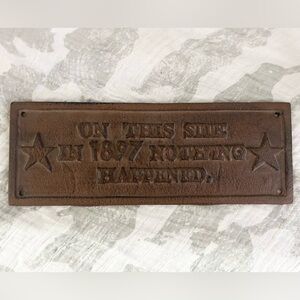 Cast iron Sign “On this site in 1827 nothing happened”